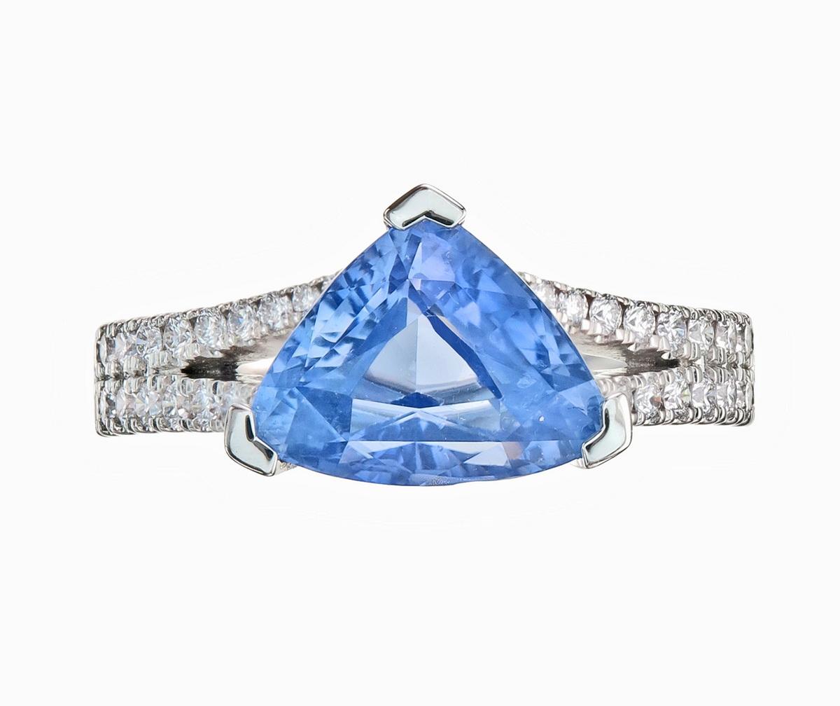 Orloff of Denmark's own; 'Cerulean Crystal'
A split-shank engagement ring forged in 950 platinum featuring an absolutely sensational trillion cut Sri Lankan (Ceylon) sapphire complimented with VS1, D-F brilliant-cut diamonds half-way down the