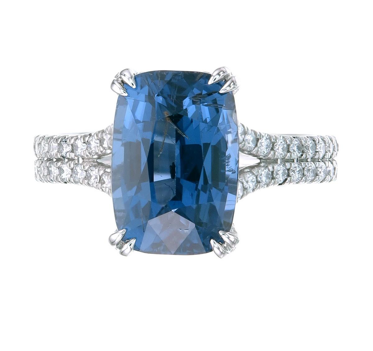 Orloff of Denmark's very own 'Neptunian Moonlight'
An extraordinary 5.10 carat blue spinel set in 950 platinum. The split-shank ring which the gem is set upon is adorned with wonderful VS1, brilliant diamonds spanning from the bottom of the band,