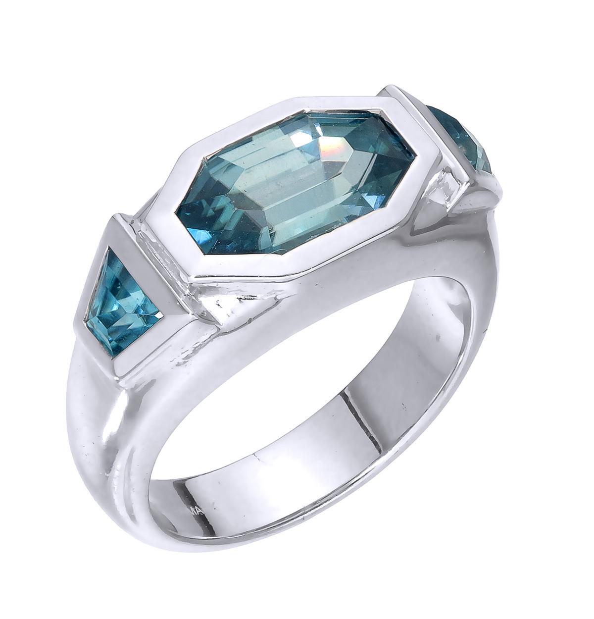 Orloff of Denmark; 925 Sterling Silver Ring set with three Natural Cambodian Blue Zircons totaling to 5.24 carats.

This piece has been meticulously hand-crafted out of 925 sterling silver.
In the center sits a 4.04 carat blue zircon mined, polished