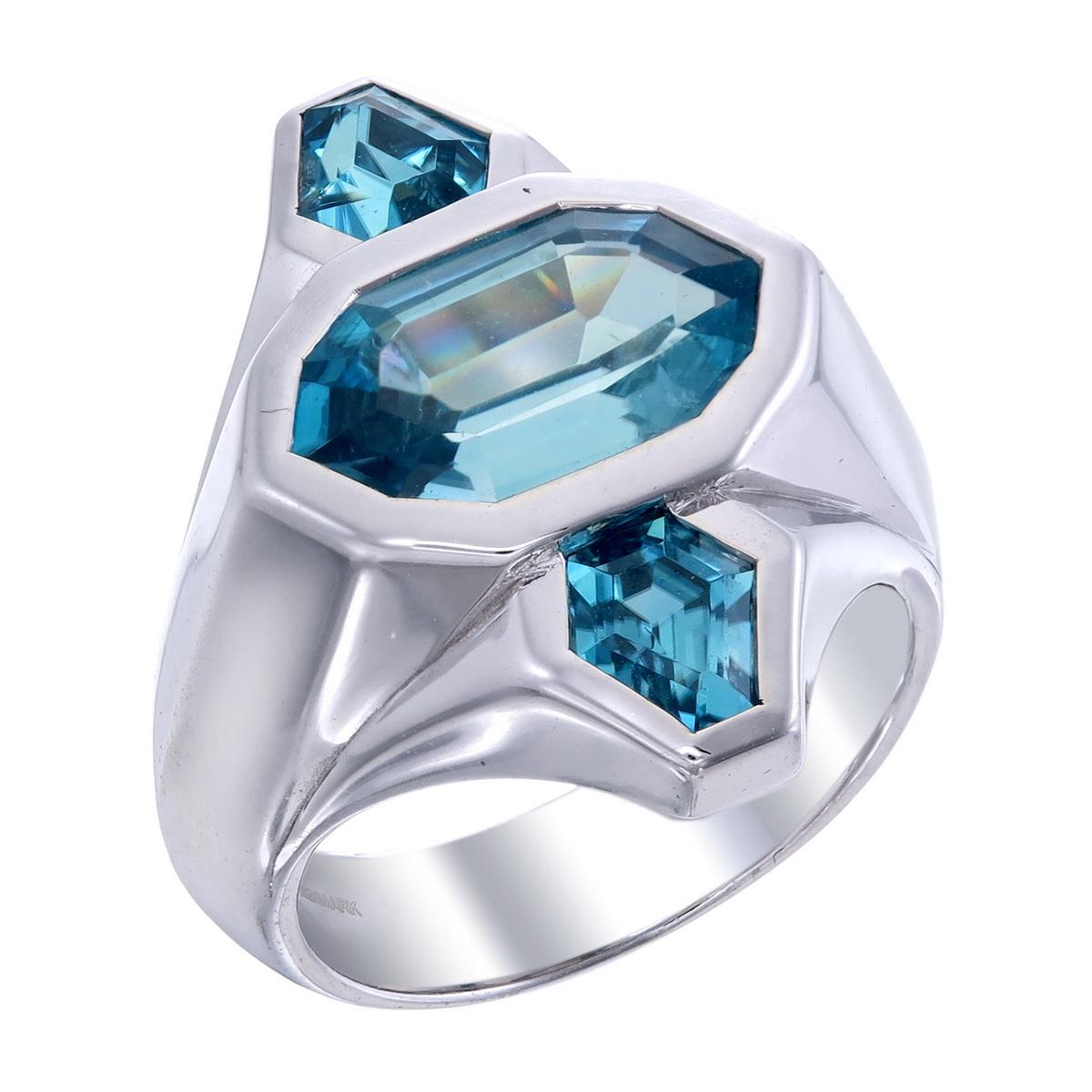 Orloff of Denmark; Natural Blue Zircon Three-Stone ring set in 925 Sterling Silver.

Featured on this peace are three metallic blue zircons mined in Ratanakiri, Cambodia and later re-cut in Bangkok, Thailand.
Presented in an exclusive North-to-South