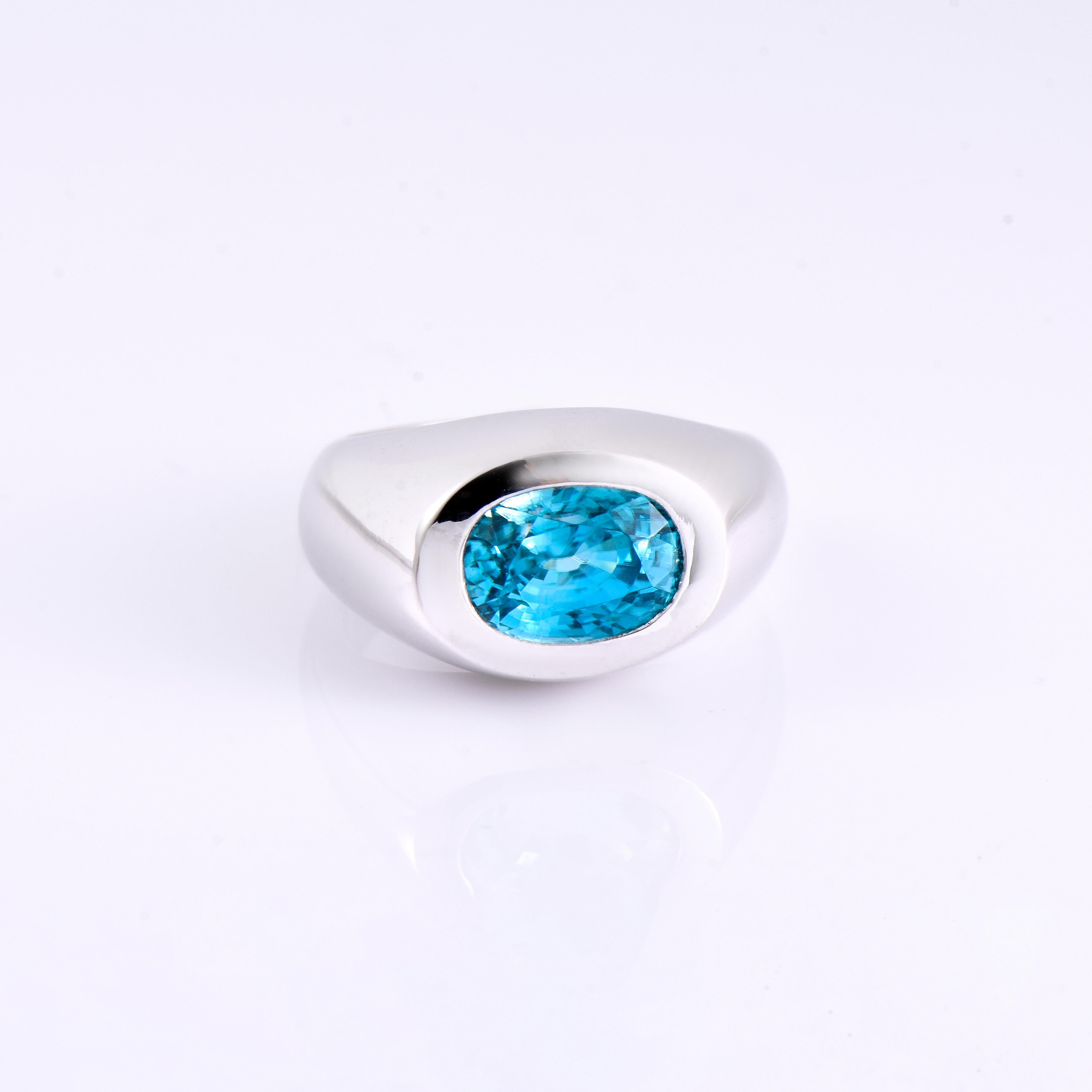 Orloff of Denmark; 925 Sterling Silver Ring set with a 5.92 carat Natural Cambodian Blue Zircon.

This piece has been meticulously hand-crafted out of 925 sterling silver.
In the center sits a fantastic 5.92 carat blue zircon mined, polished and cut