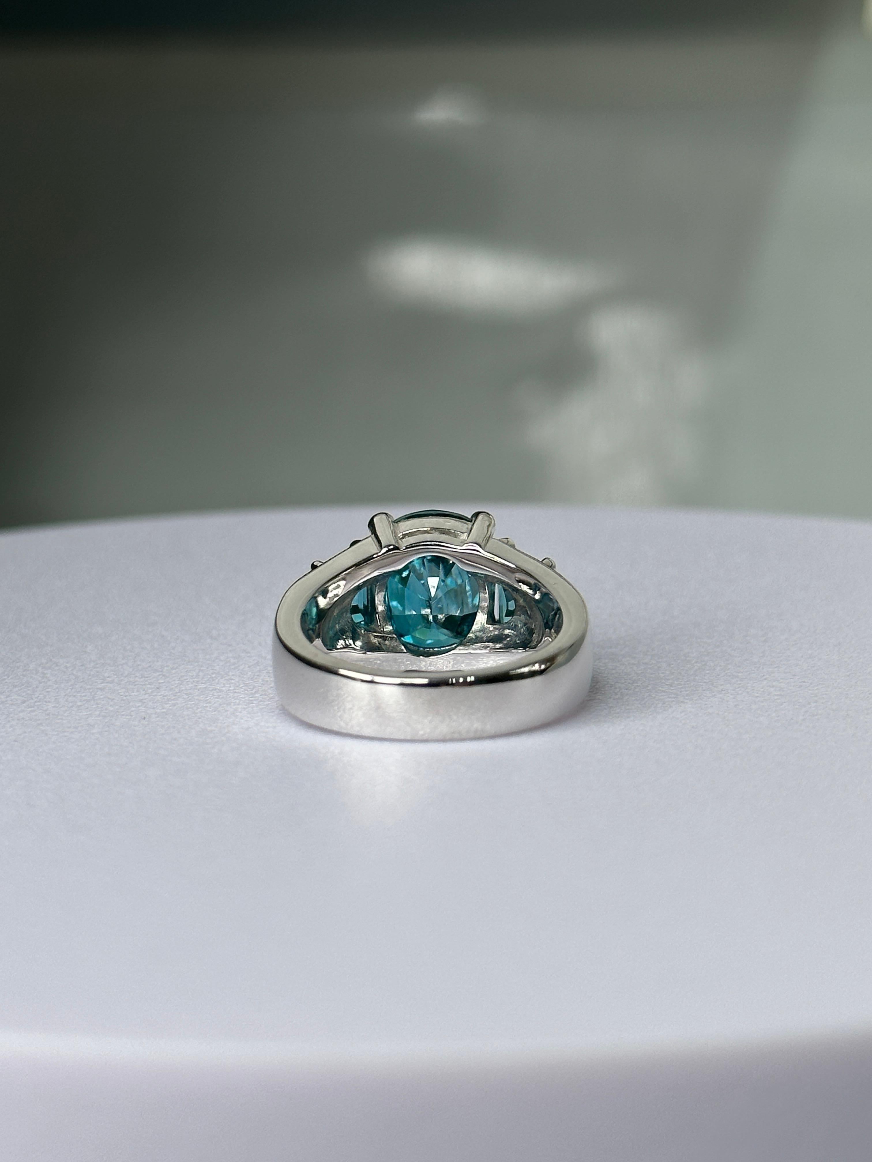 Women's or Men's Orloff of Denmark, 7.83 ct Blue Zircon Three-Stone Ring set in Sterling Silver For Sale