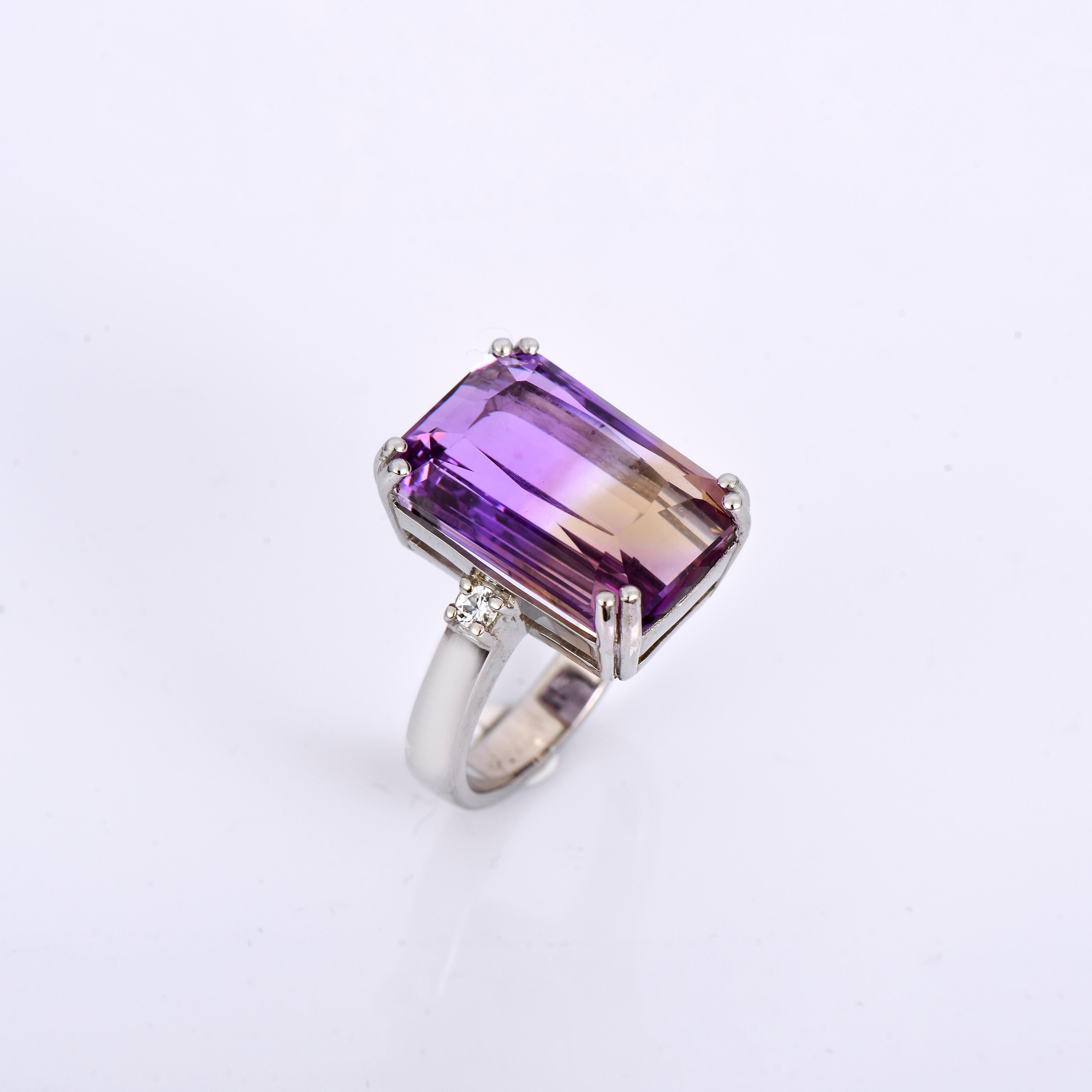 Orloff of Denmark; Ametrine Ring set with two white sapphires in 925 Sterling Silver.

A dazzling, handcrafted 925 sterling silver ring, crowned with a magnificent ametrine gemstone. Ametrine, a rare and natural convergence of amethyst and citrine,