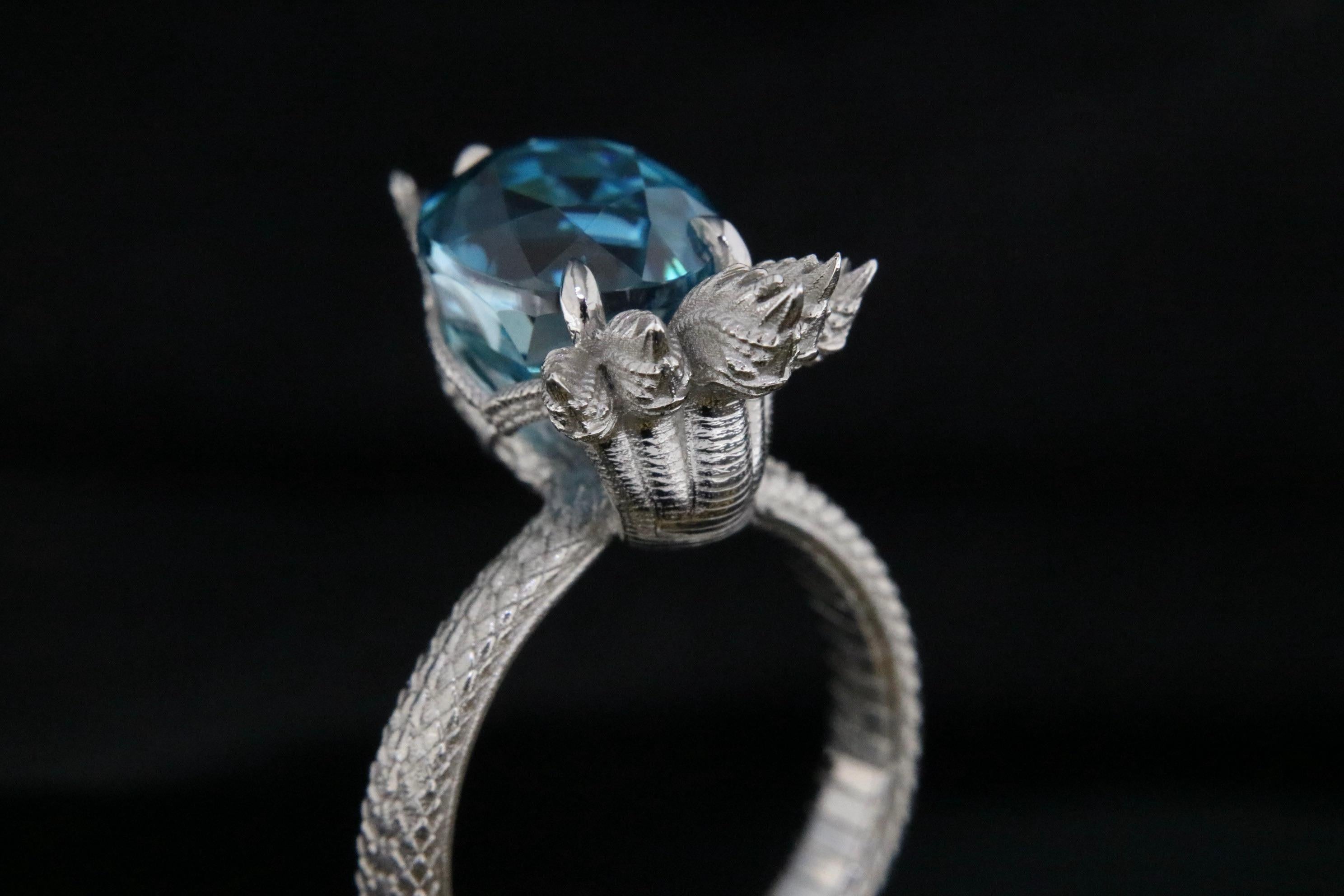 Orloff of Denmark: Auspicious Five-Headed Naga, 6.41 carat Blue Zircon Sculpture Ring.
The Naga, meaning 'a deity in the form of a serpent' in ancient Sanskrit, is a commonly found symbol throughout Asia. They are said to be benevolent spirits that