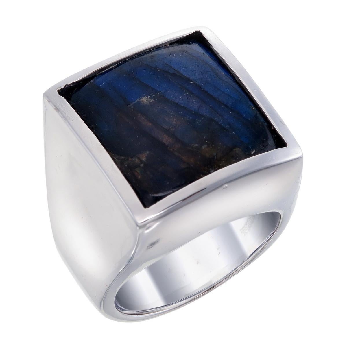 Orloff of Denmark; 17.38 carat Sculpture ring fashioned out of 925 Sterling Silver.

Discover a captivating symphony of color and intrigue in this sterling silver ring adorned with a remarkable 17 carat labradorite gem. With every movement, this