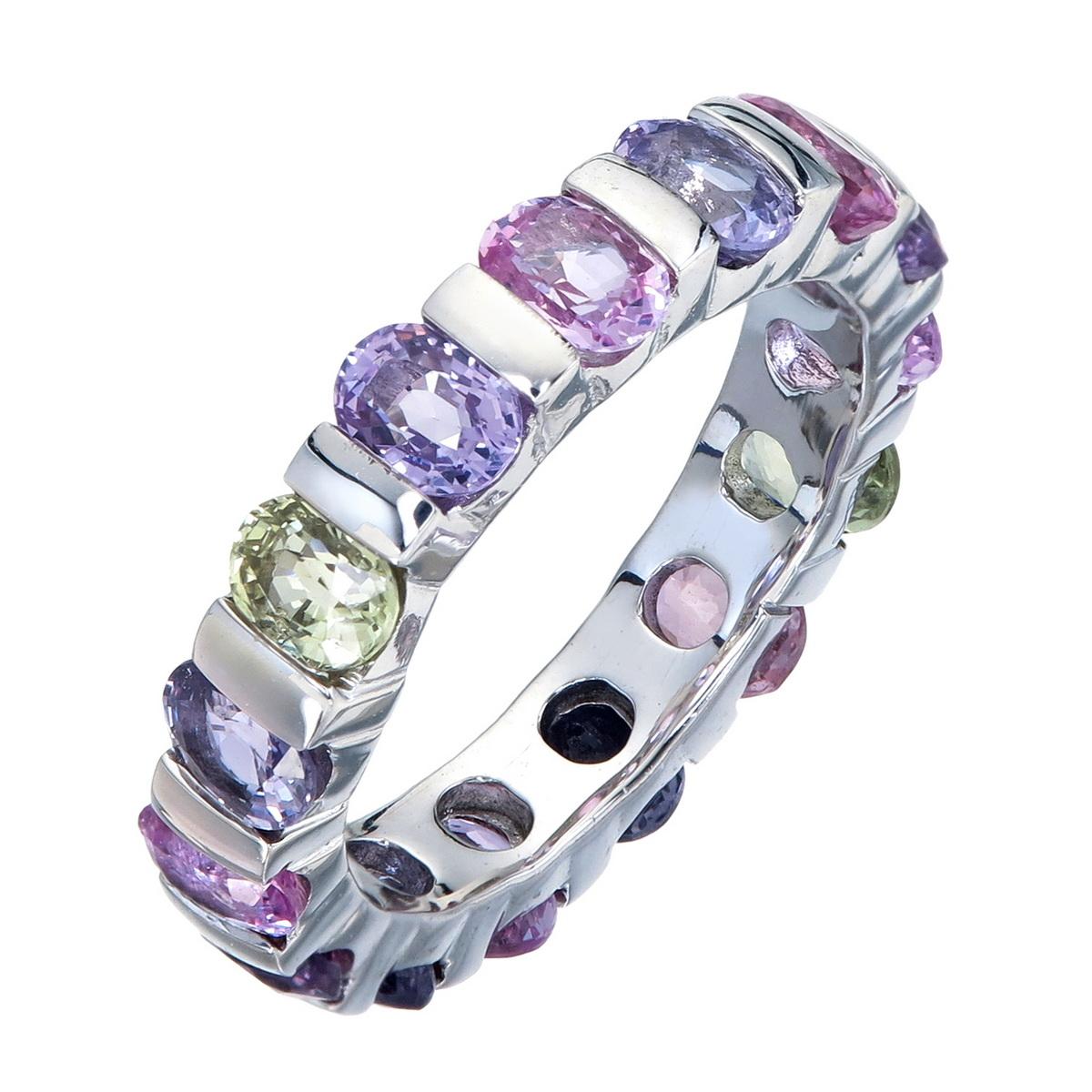 Orloff of Denmark; Fifteen Fancy Sapphire Eternity Band set in 925 Sterling Silver.

Ranging from pink and purple to even light green, these fancy sapphires come together to form a gorgeous band of eternal color and sparkle.
Elegantly flush-set in