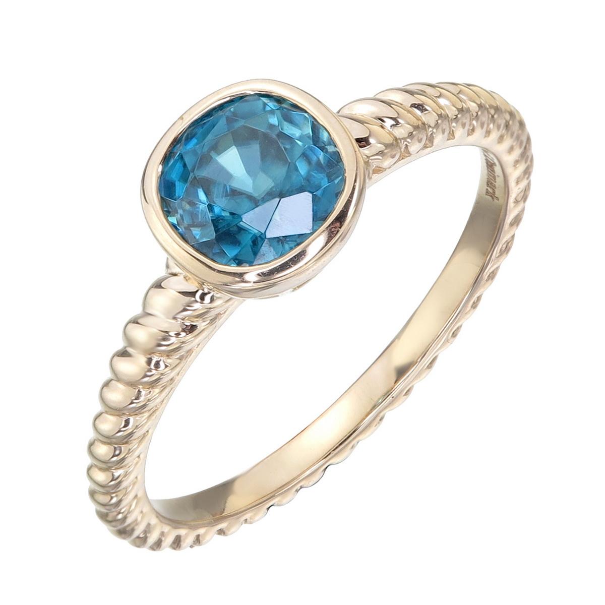 Orloff of Denmark; 14 Karat Solitaire Ring set with a spectacular 1.69 carat Ocean Blue Zircon from Ratanakiri, Cambodia.
With extraordinary brilliance and a fiery dispersion, this ocean blue zircon has been set on a 14 Karat twisted rope gold