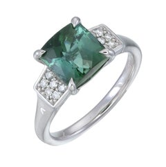 Orloff of Denmark Platinum ring set with a green tourmaline and diamonds