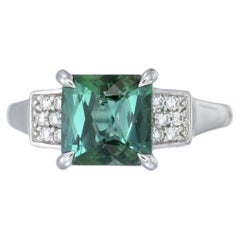 Orloff of Denmark Platinum ring set with a green tourmaline and diamonds
