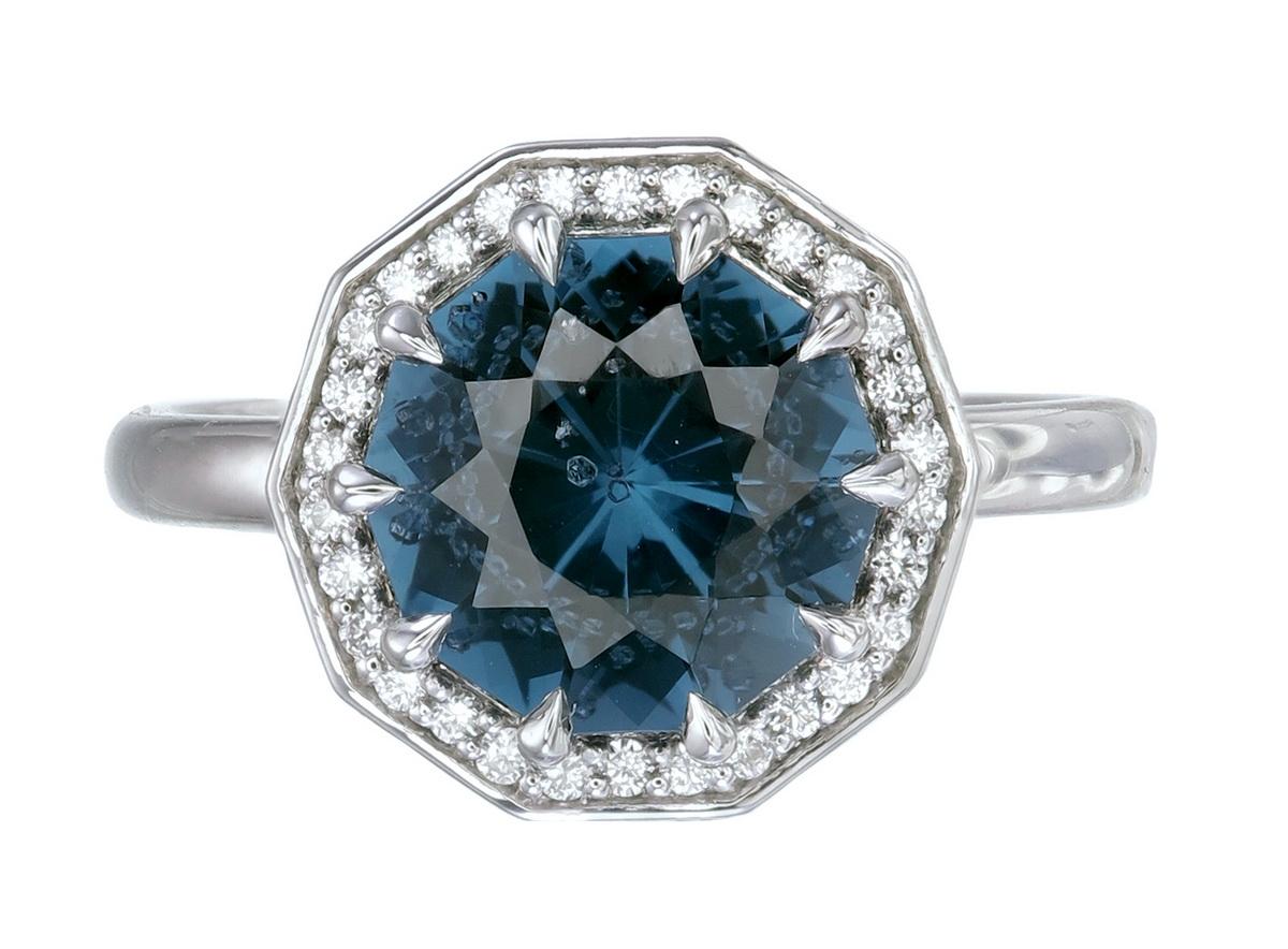 Orloff of Denmark's; Ocean Fangs.
A 3.32 Carat Blue Spinel Diamond Ring Set in 950 Platinum

This absolutely stunning Spinel captures the near never-ending depths of the ocean itself through it's deep blue color and sharp cascading pavillion.