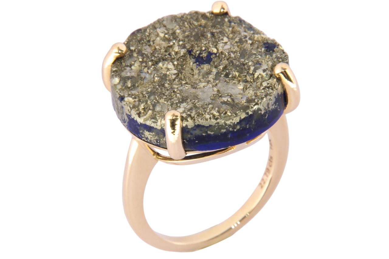 Orloff of Denmark; 22.79 carat Lapis Lazuli Sculpture ring fashioned out of 14K Yellow Gold.

This exquisite ring features a bold lapis lazuli gemstone, renowned for its deep celestial blue, which has been a symbol of royalty and honor, power,