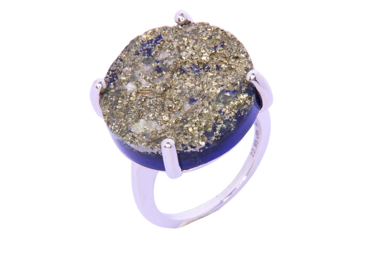 Orloff of Denmark; 22.79 carat Lapis Lazuli Sculpture ring fashioned out of 14K Yellow Gold.

This ring presents a harmonious blend of rugged natural beauty and sleek design. Set in sterling silver, the central lapis lazuli stone captivates with its