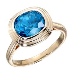 Orloff of Denmark, Triple Bezel 6.12 ct Blue Zircon Ring set in 14K Yellow Gold