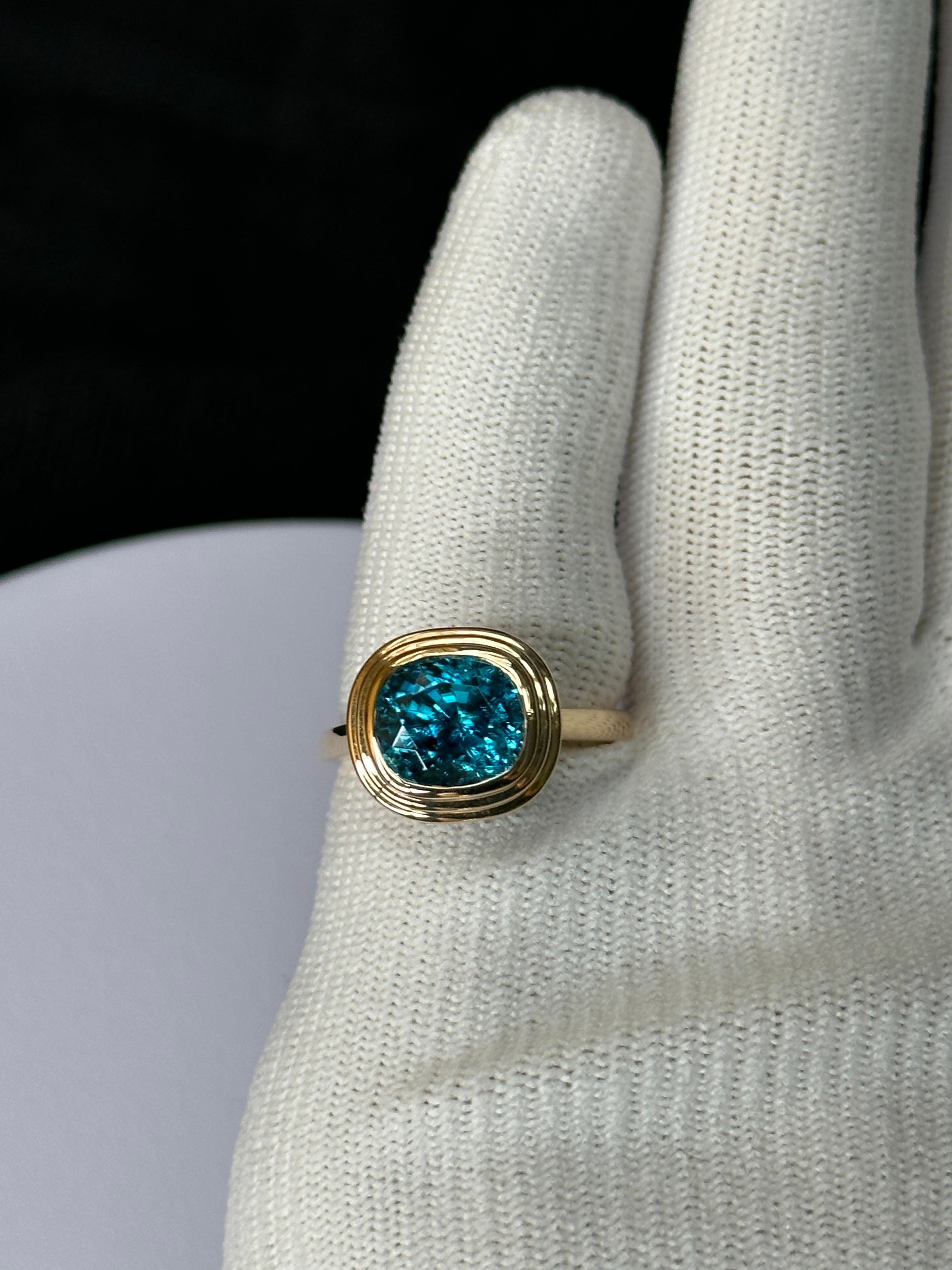 Orloff of Denmark, Triple Bezel 6.12 ct Blue Zircon Ring set in 14K Yellow Gold In New Condition For Sale In Hua Hin, TH