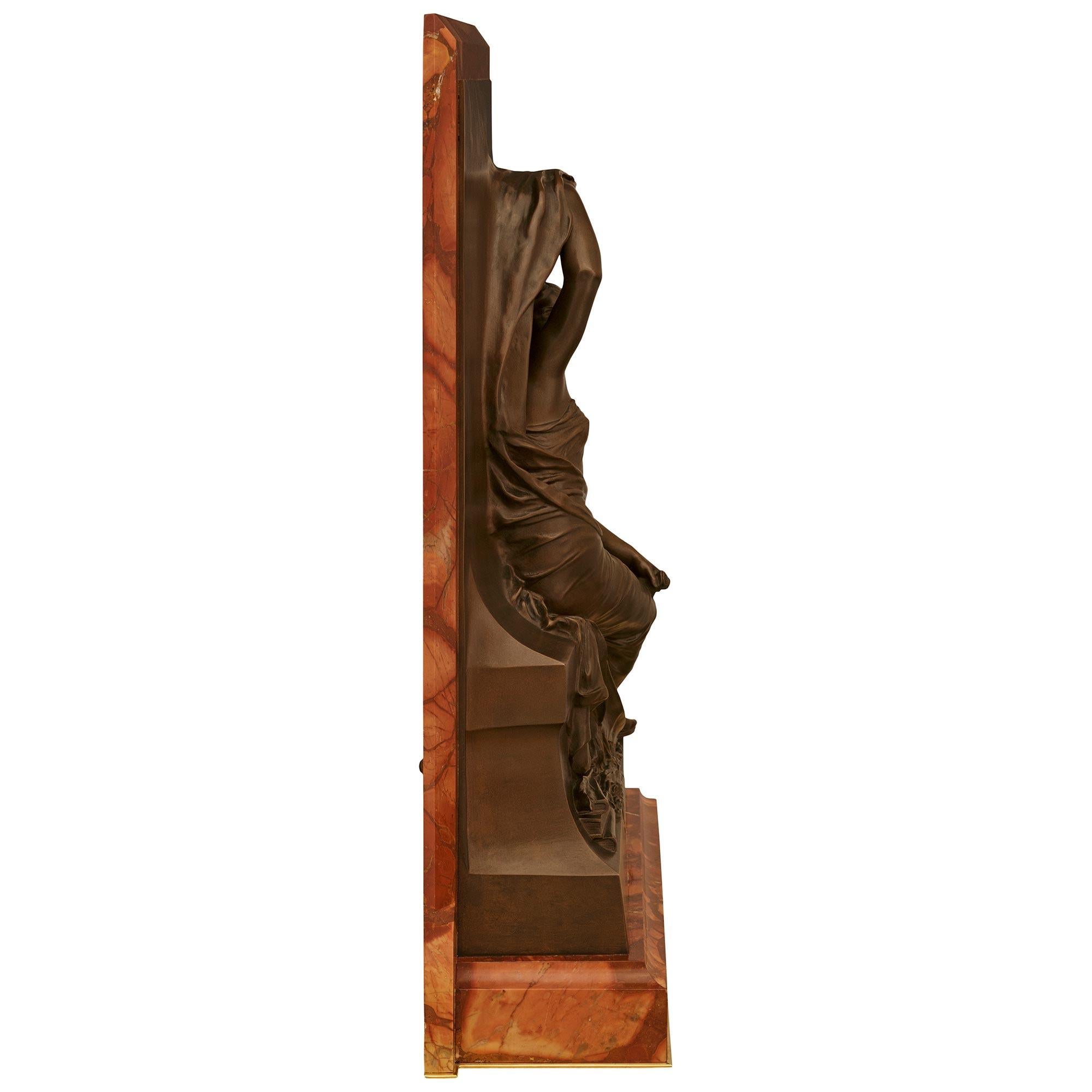 Patinated Ormolu and Breccia Pernice marble trophy of Clio, singed by Henri Chapu For Sale