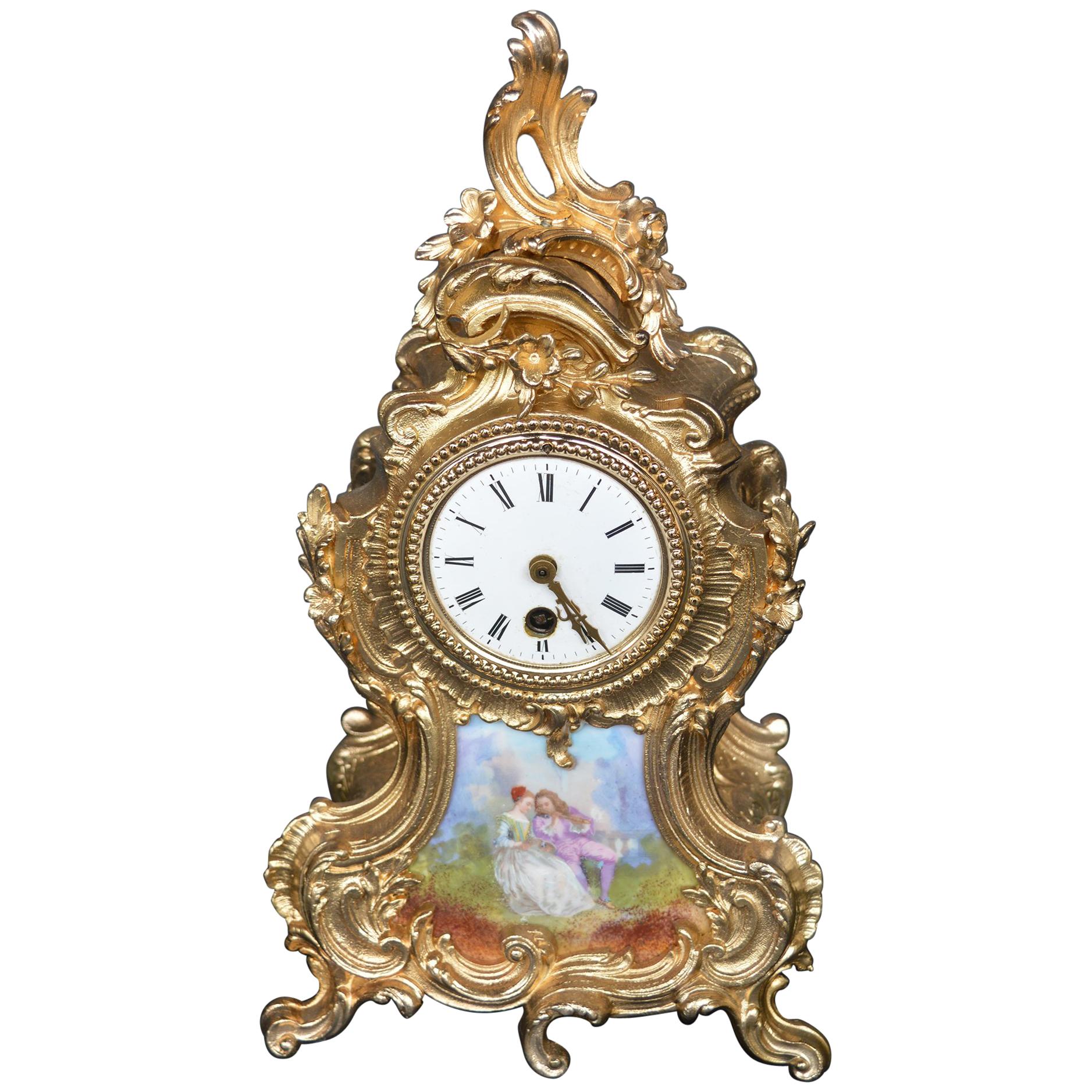 Horloge en bronze doré et peinte à la main