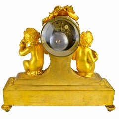 French Napoleon III Gilt Bronze and Porcelain Putti Clock