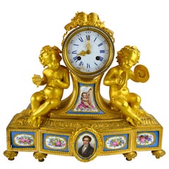  French Napoleon III Gilt Bronze and Porcelain Putti Clock