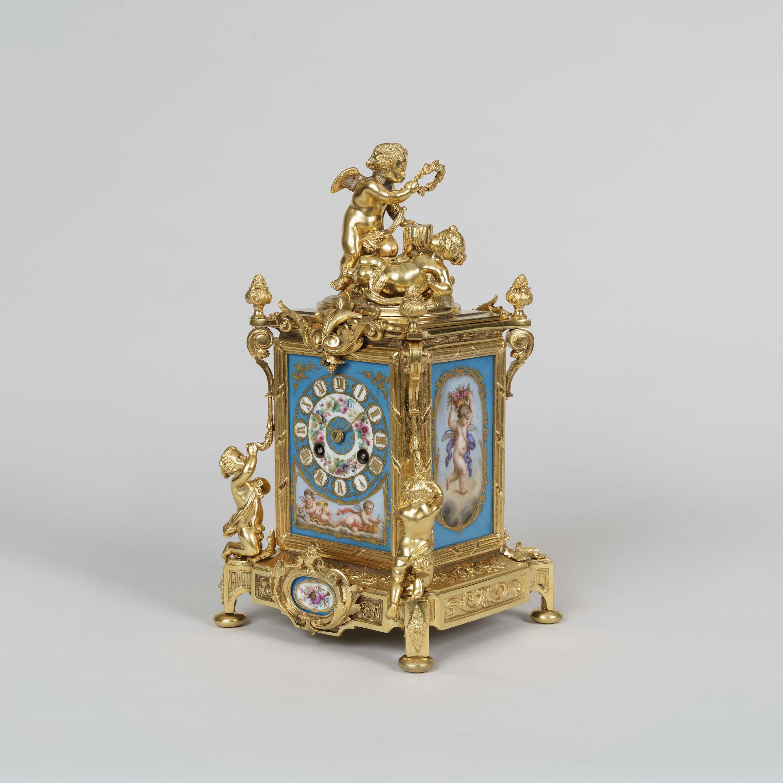 French Ormolu and Sèvres Style Porcelain Mounted Clock Set in the Louis XVI Manner For Sale