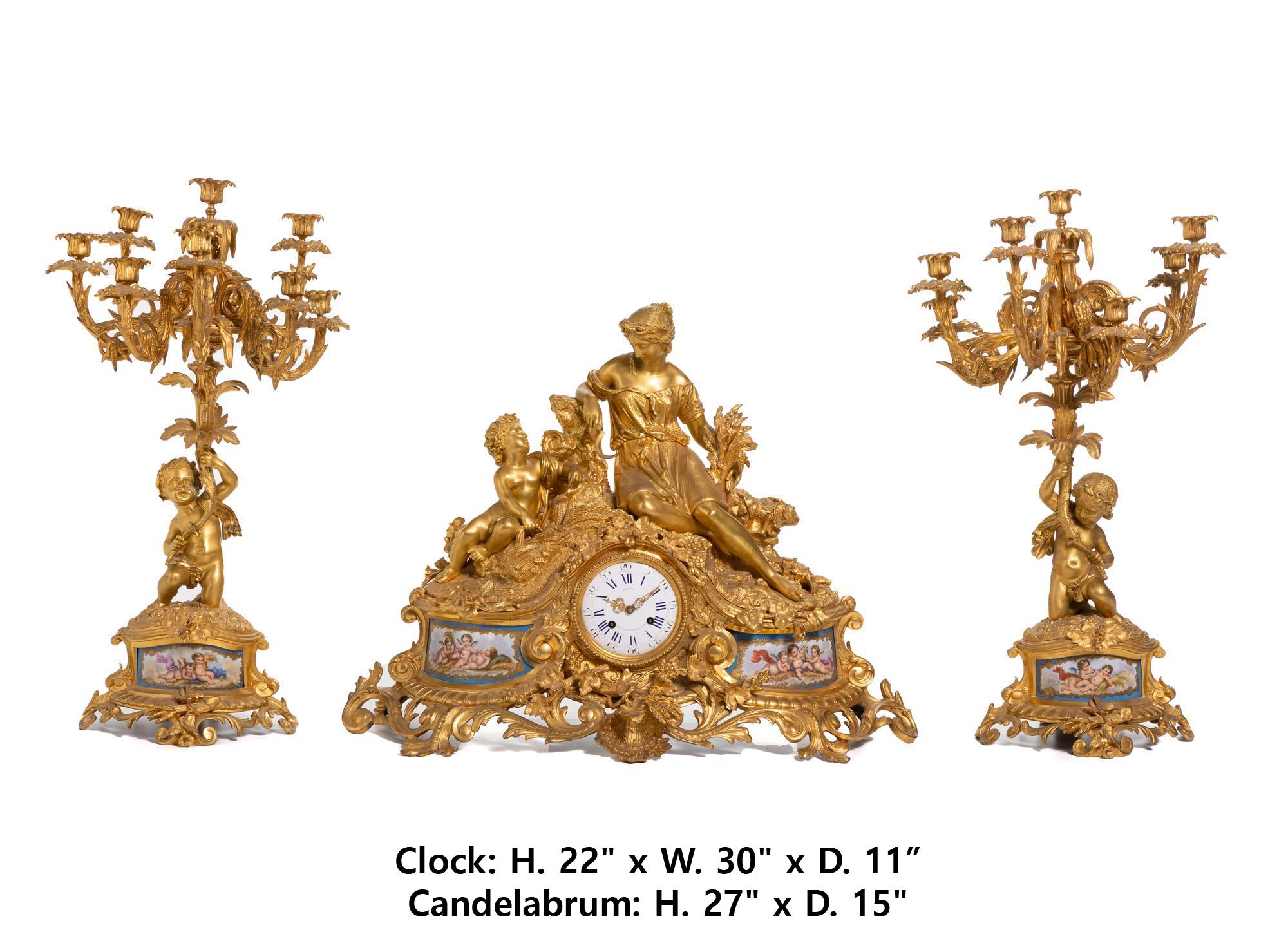 Exceptional Late 19th Century French Louis XV Style ormolu and Sevres style porcelain 3 piece  clock garniture set
Dial marked: Richond / Boult. / Montmartre 21 Paris; Movement marked: Roblin / A Paris / 12686 
The clock with an enameled metal dial,