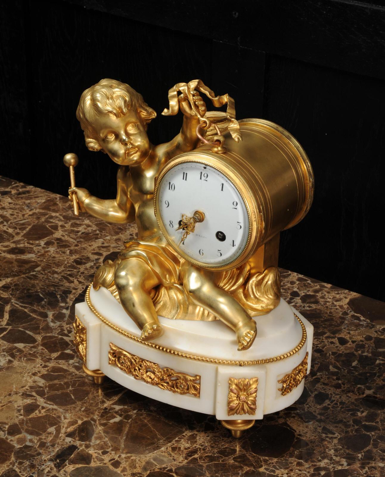 Ormolu and White Marble Antique Clock, Putto Floating in Clouds Playing a Drum 4