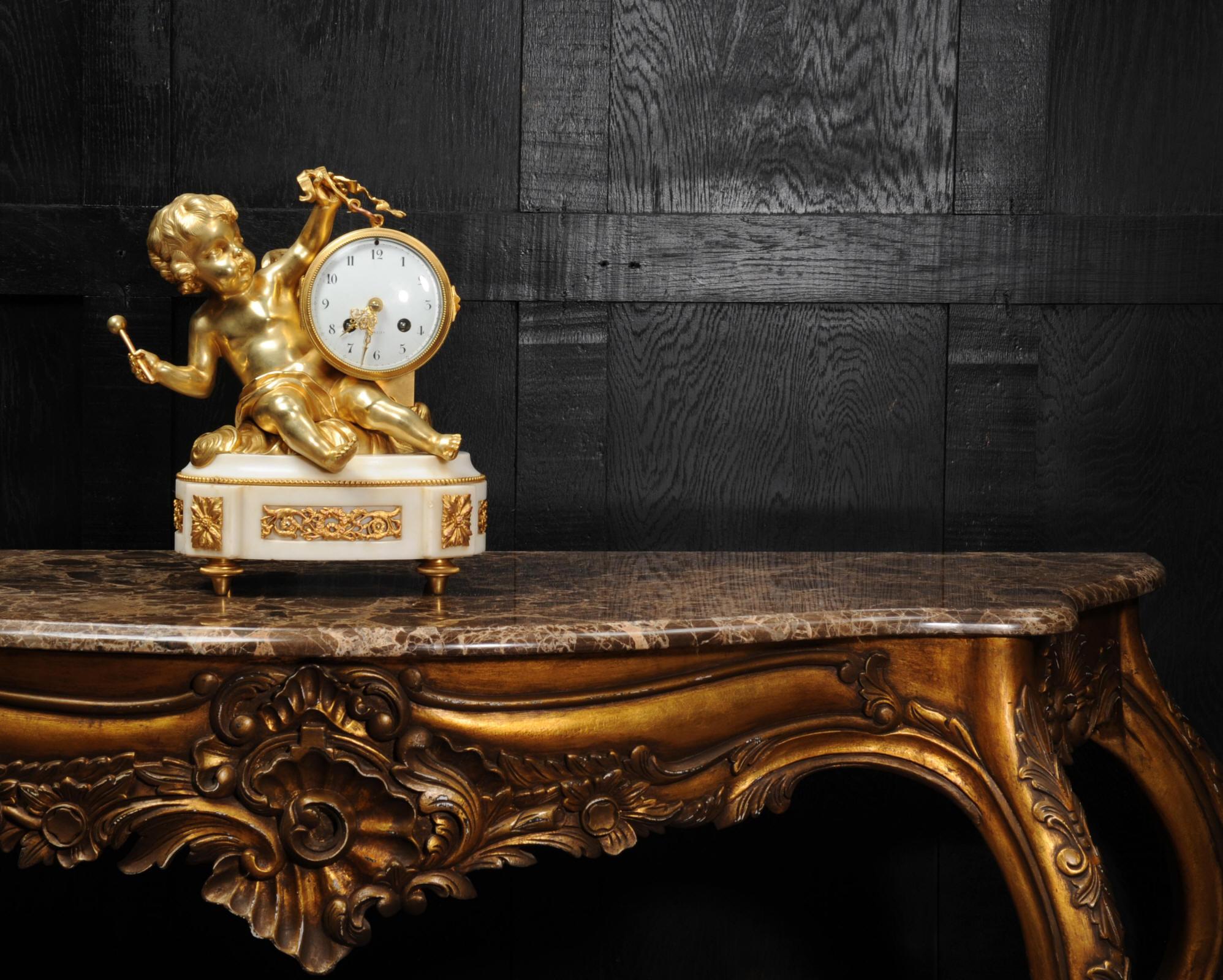 Ormolu and White Marble Antique Clock, Putto Floating in Clouds Playing a Drum In Good Condition In Belper, Derbyshire
