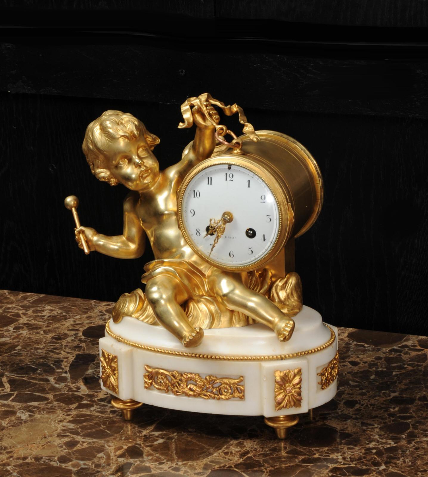 19th Century Ormolu and White Marble Antique Clock, Putto Floating in Clouds Playing a Drum