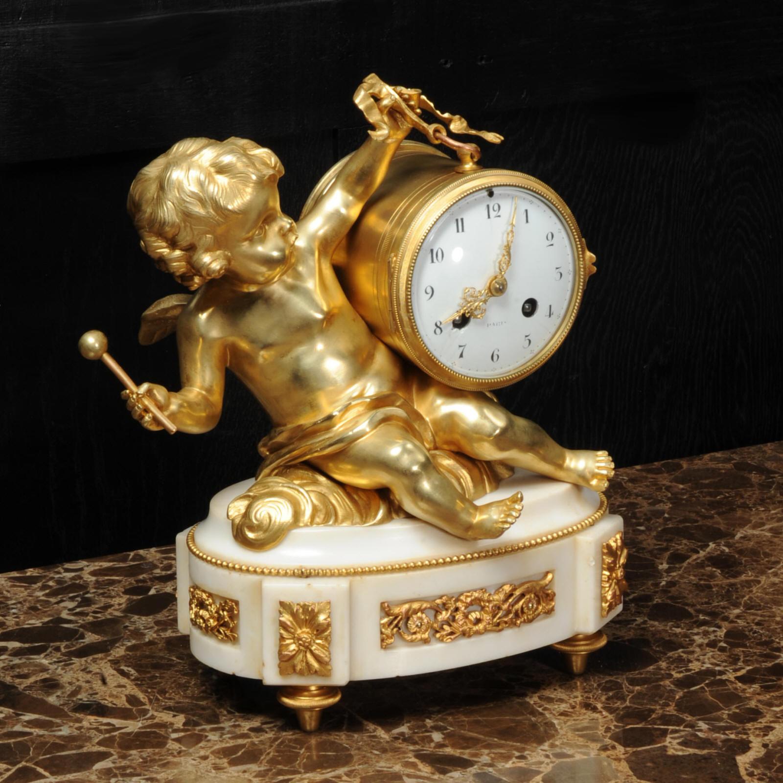 Ormolu and White Marble Antique Clock, Putto Floating in Clouds Playing a Drum 2