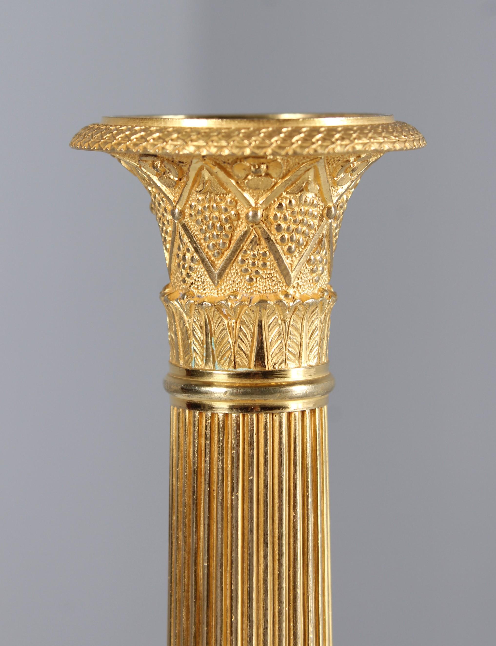 Antique candlestick

France
Gilt bronze
19th century

Dimensions: H x D: 27 x 13 cm

Description:
Antique French candlestick from the first half / middle of the 19th century.

Finely crafted with leaf frieze and acanthus tendrils on the round base