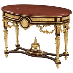 Mesa de centro ovalada francesa con tapa de mármol dorado
