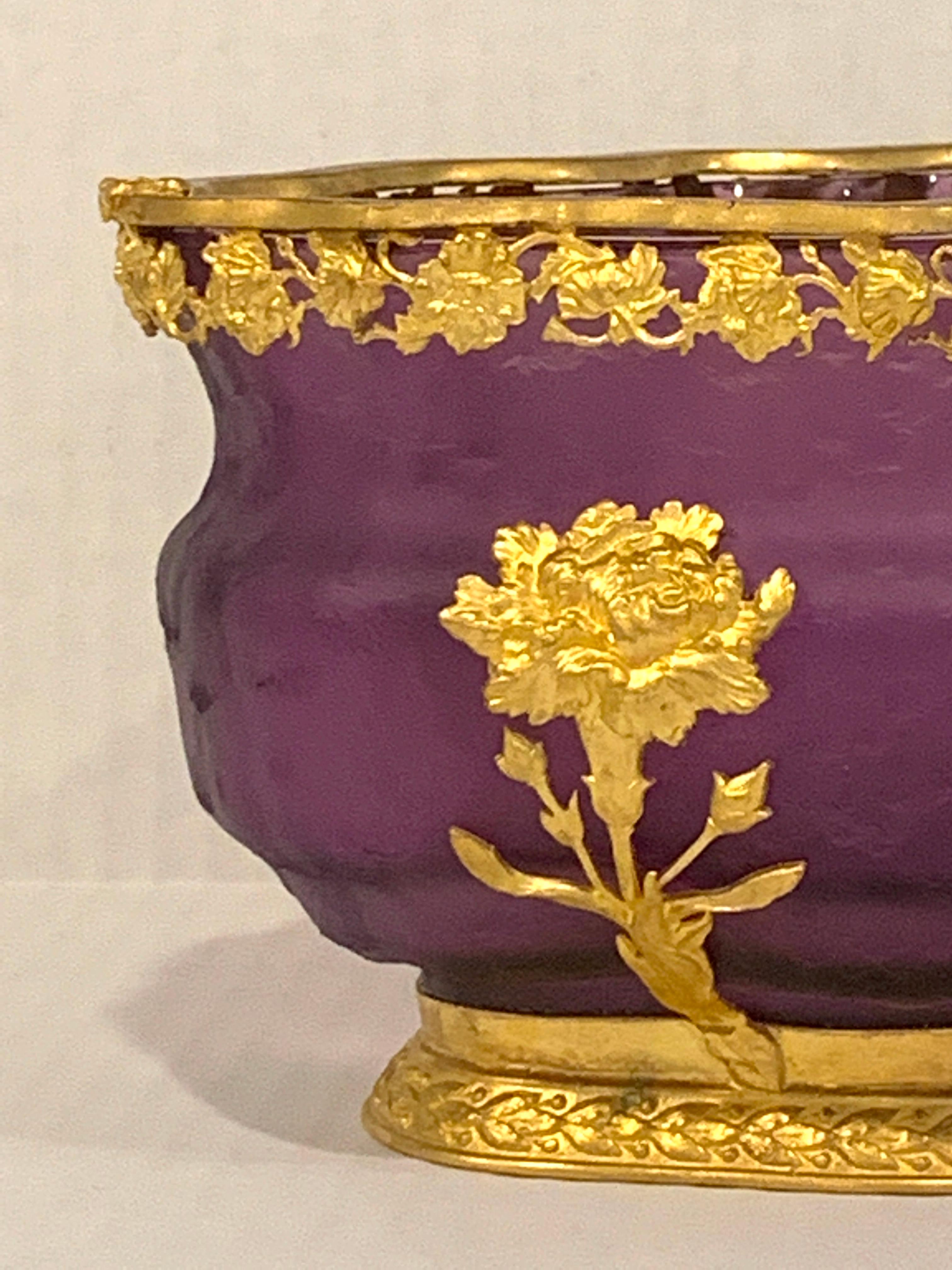 Ormolu-mounted Baccarat amethyst chipped ice centerpiece, of oval form with floral ormolu mounts, interior measures 8.5