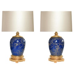 Lampes en porcelaine bleue montées sur bronze doré