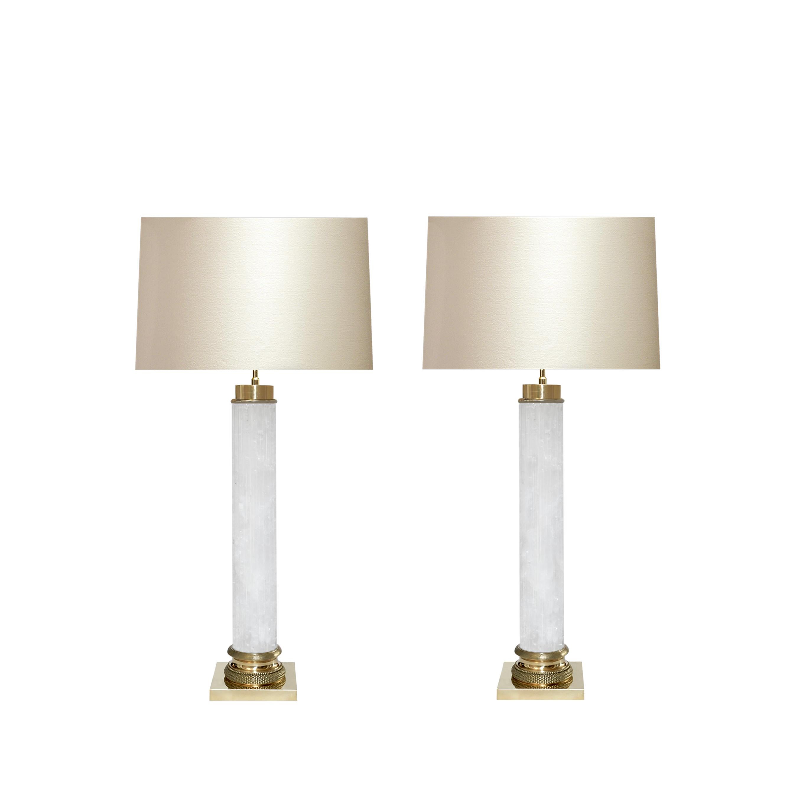 Pair of carved column style ormolu-mounted rock crystal lamps by Phoenix. 
(Lampshade not included).
 