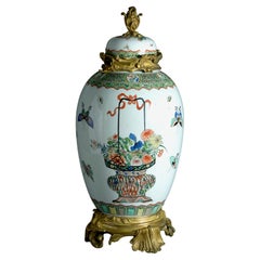 Vase et couvercle de la période Kangxi montés sur bronze doré