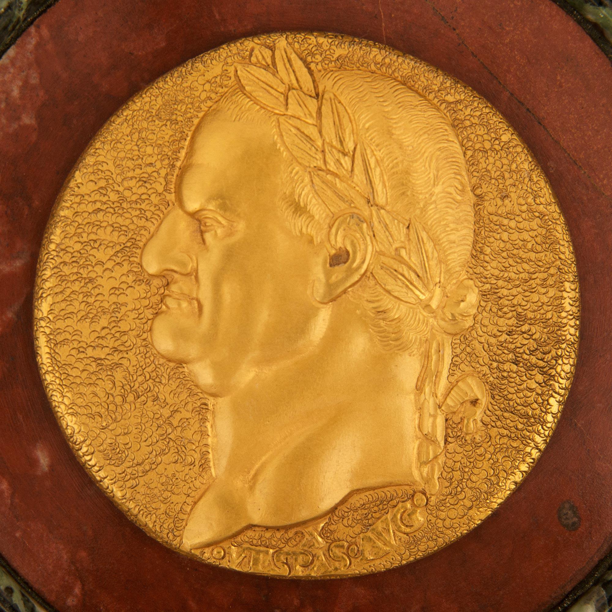 Ormolu, Vert de Patricia, and Rosso Antico marble Roman Emperor plaques In Good Condition For Sale In West Palm Beach, FL