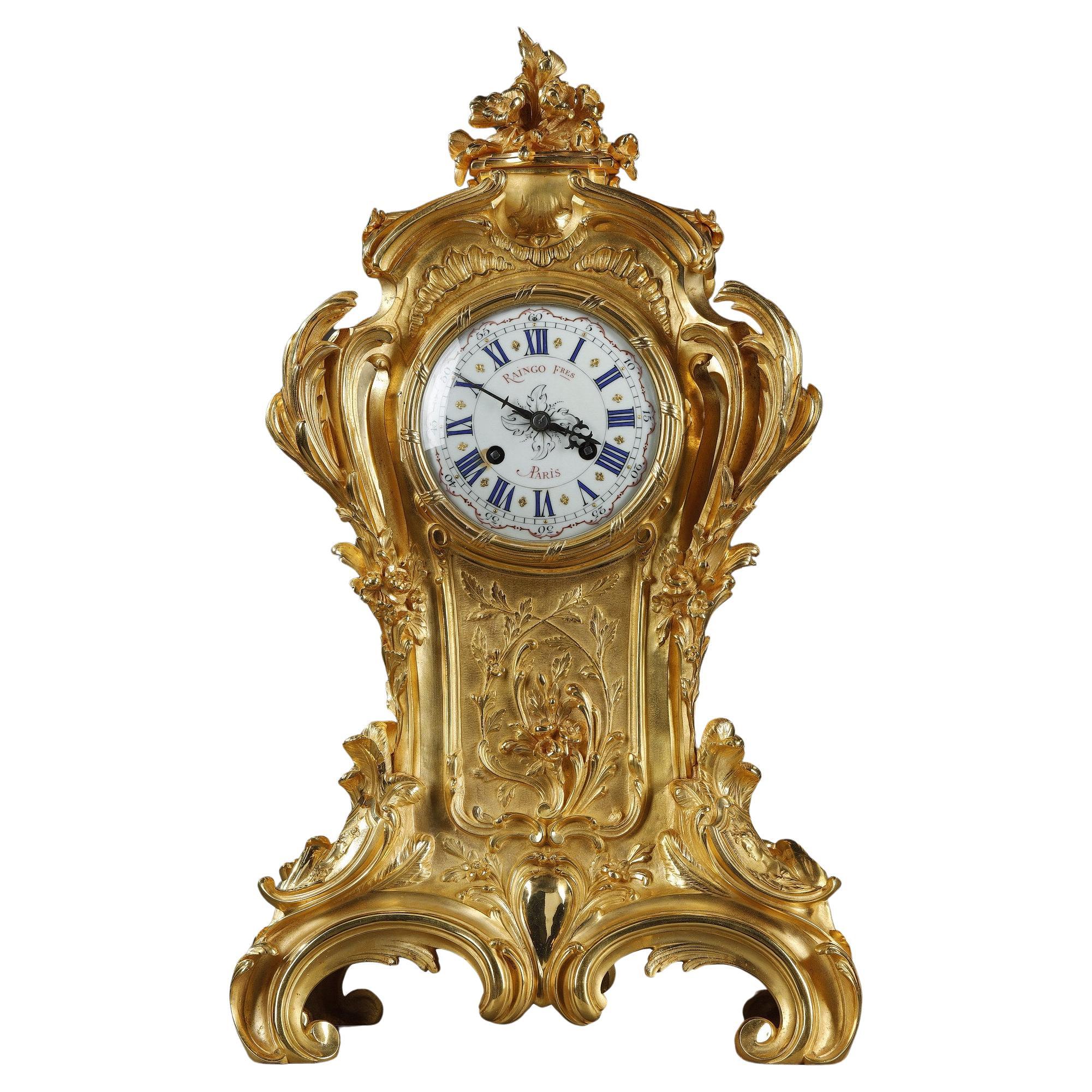 Ormulu and Chased Bronze Rocaille Clock, Raingo & Frères For Sale