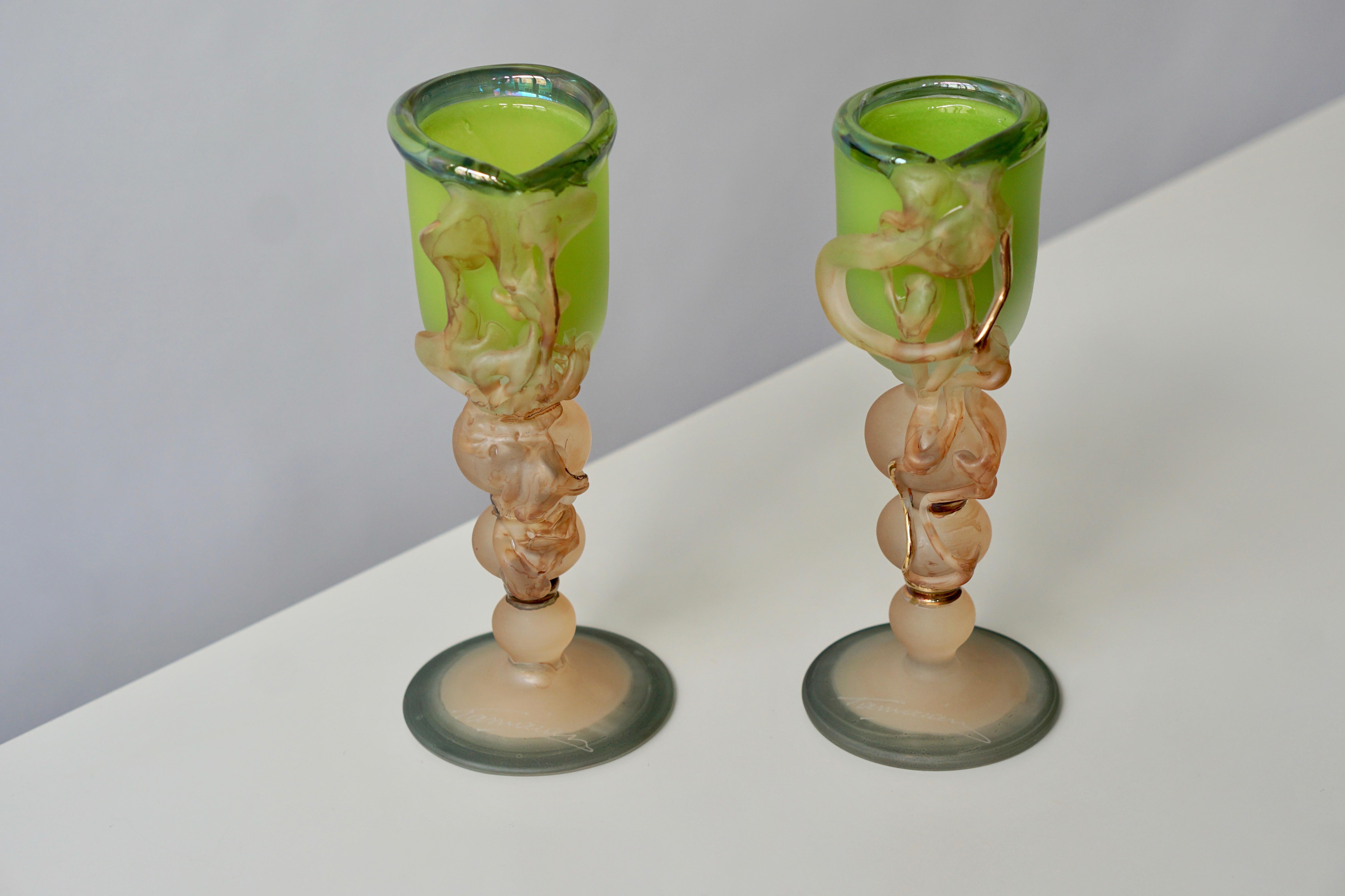 Two ornamental glasses by Tamaian.
Measures: Height 22cm.
Diameter 9 cm.