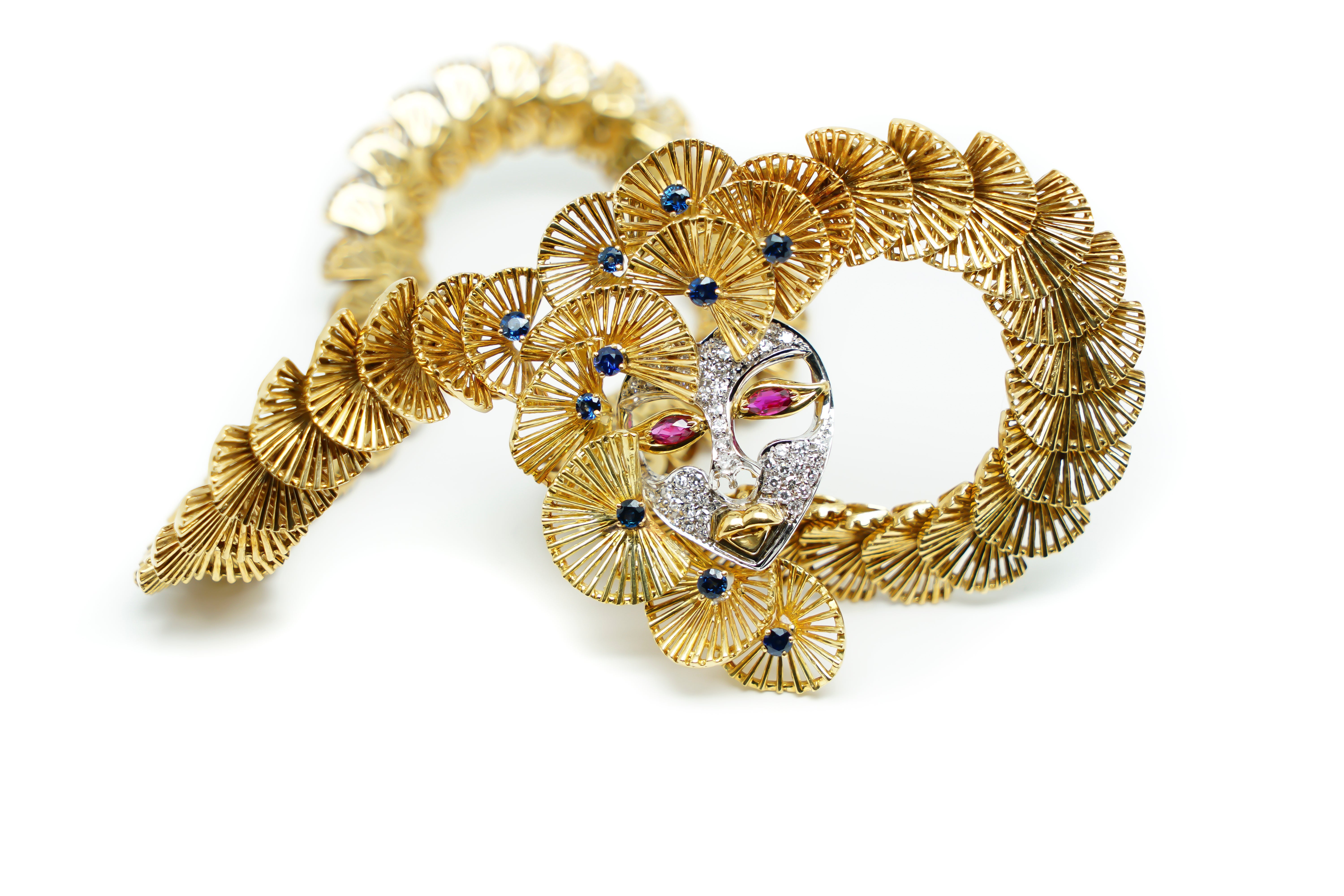 Ornamental Necklace 18 Karat Gold, Sapphires and a Mask with Rubies and Diamonds For Sale
