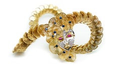 Ornamental Necklace 18 Karat Gold, Sapphires and a Mask with Rubies and Diamonds
