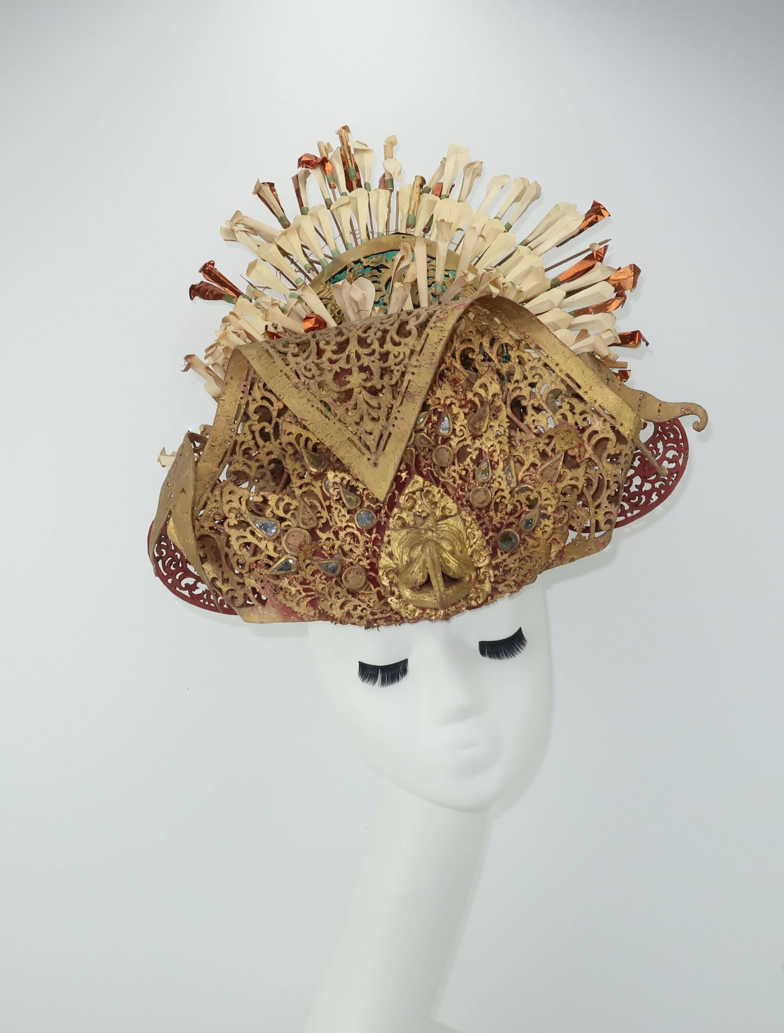 Majestically magnificent!  This Balinese headdress was acquired in the 1930's by the original owner while on a honeymoon trip.  Probably made for the tourist market, these headdresses were designed to replicate the fine bejewelled adornments worn by