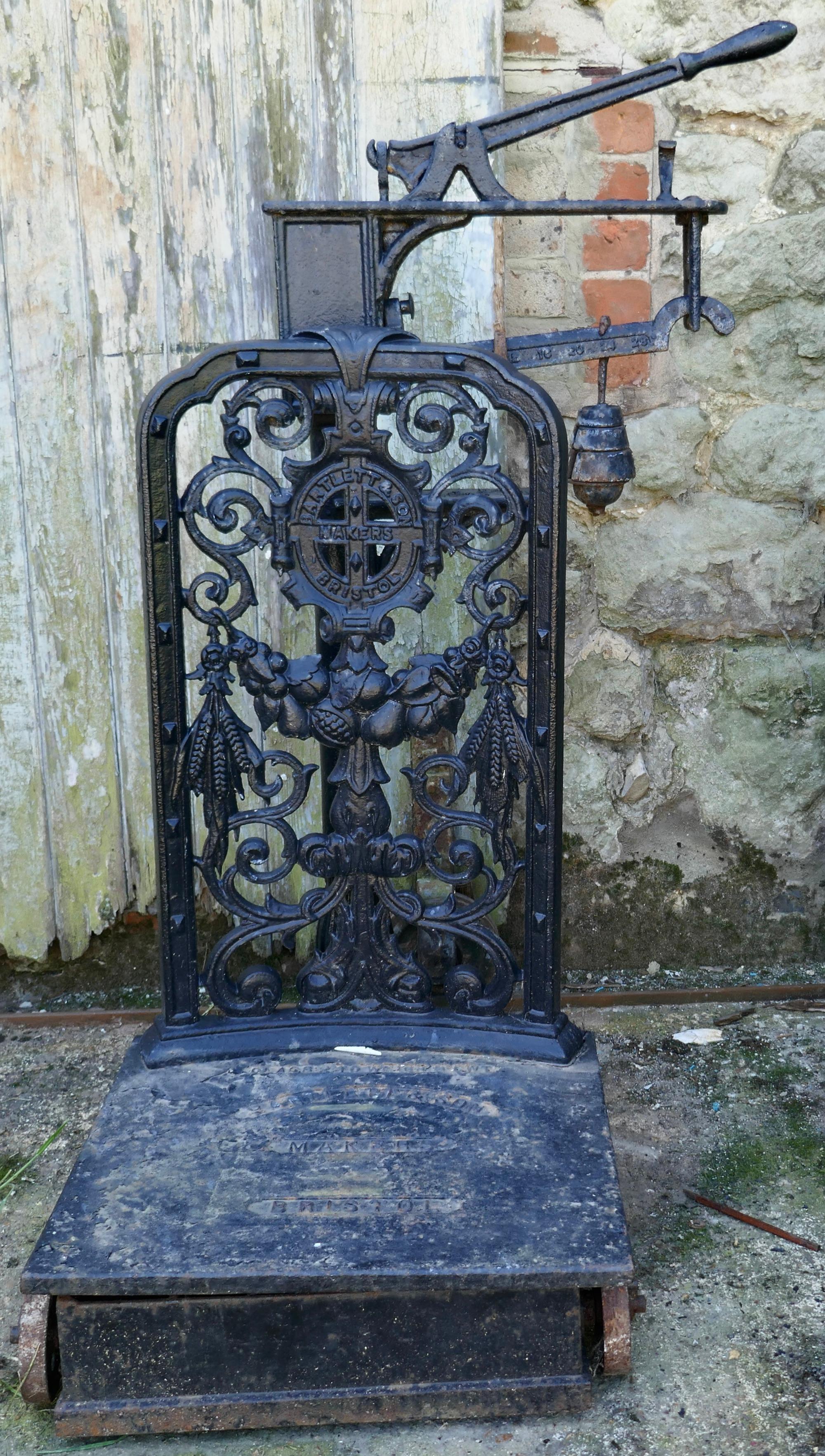 Ornate 19th Century Agricultural Sack Scales by Bartlett & Son, Bristol. 

This is a very ornate set of Scales in cast iron they would have been used for weighing sacks of many agricultural wares from the farm like corn or potatoes 
They are made