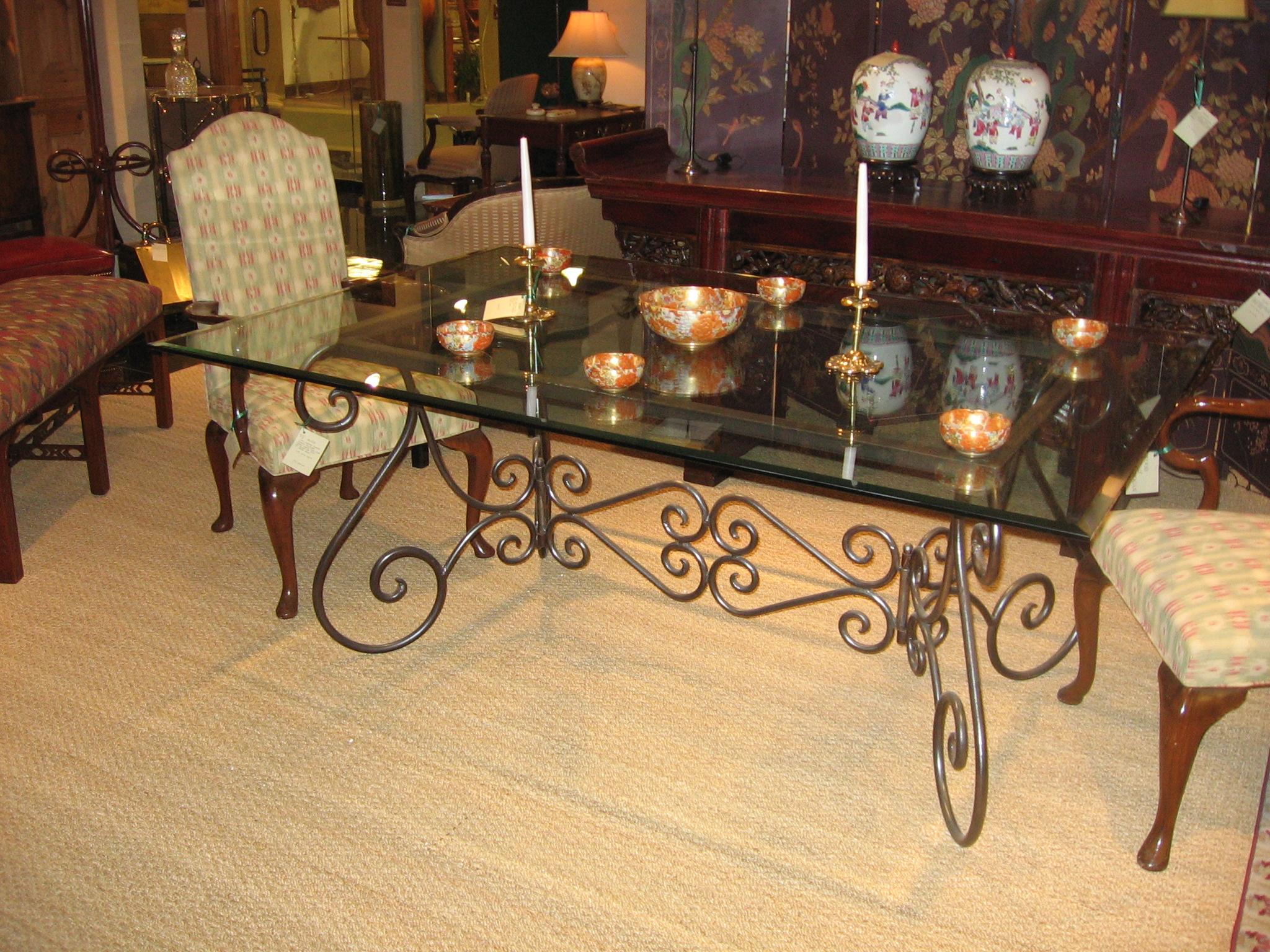 Create a peaceful dining environment in your breakfast room, back patio or dining room with this lovely 19th century French ornate polish steel base table with 1/2