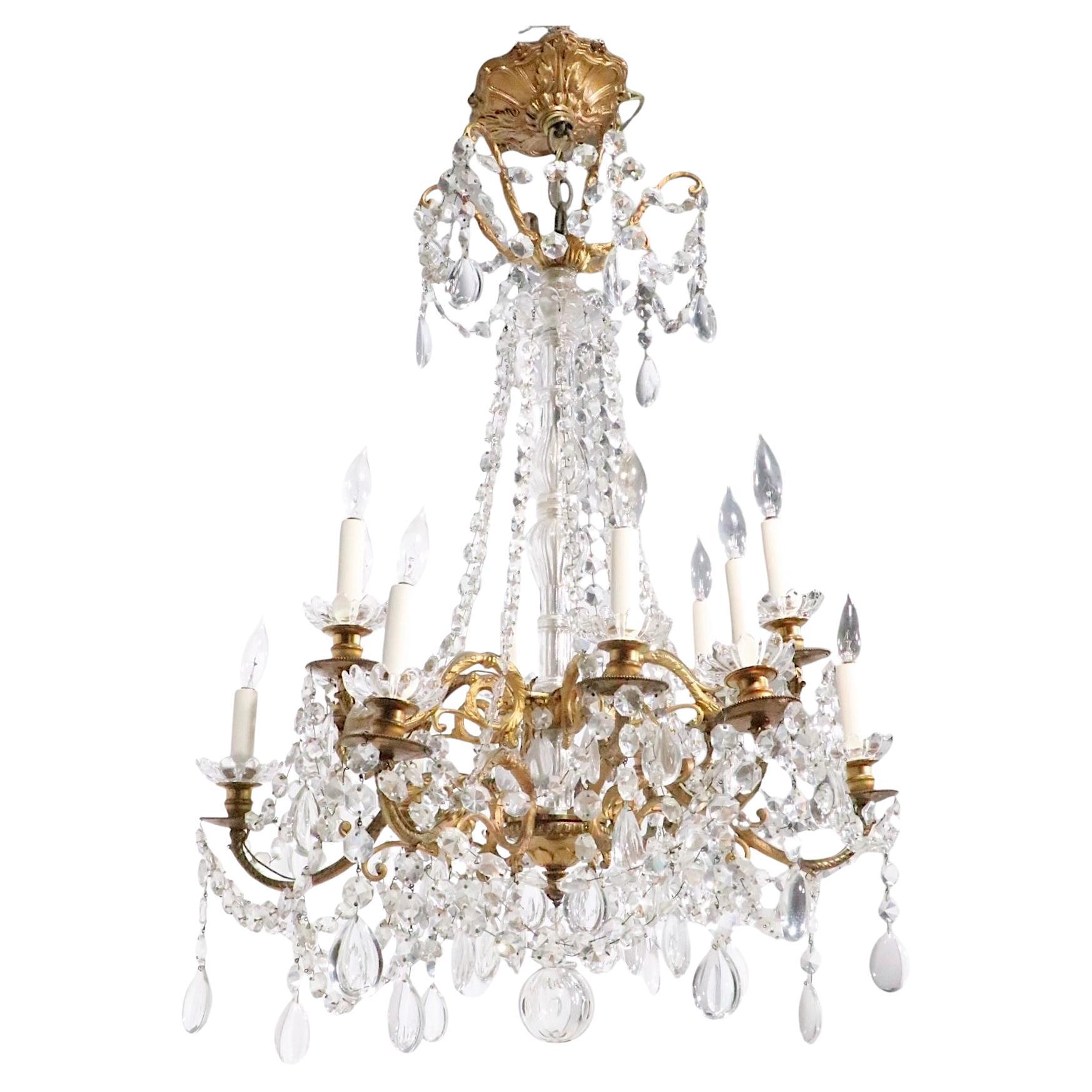 Ornate 19th Century Louis XVI French Crystal and Brass Chandelier with 12 Lights im Angebot