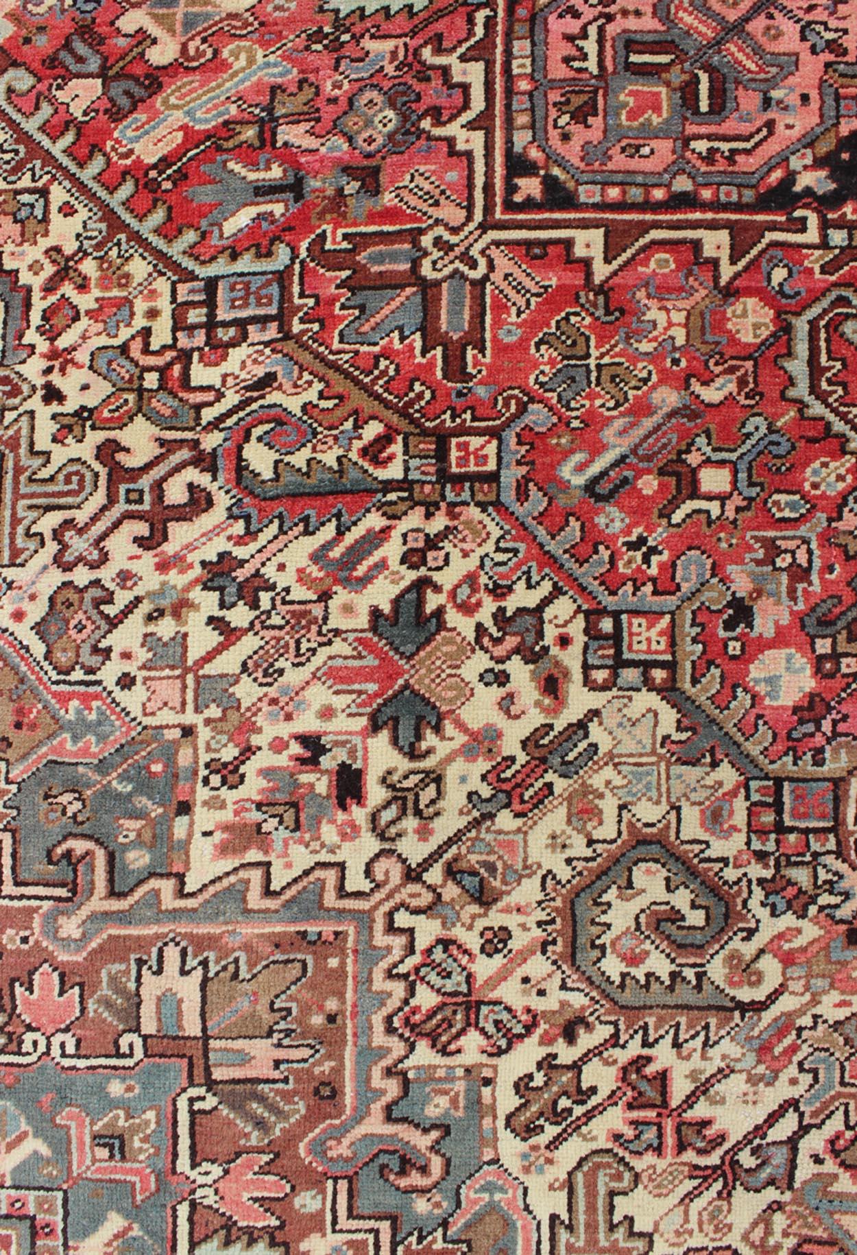 Mid-20th Century Square Shaped Semi Antique Persian Heriz Rug with Geometric Medallion 