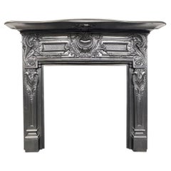 Ornate Antique late Victorian cast iron fireplace surround