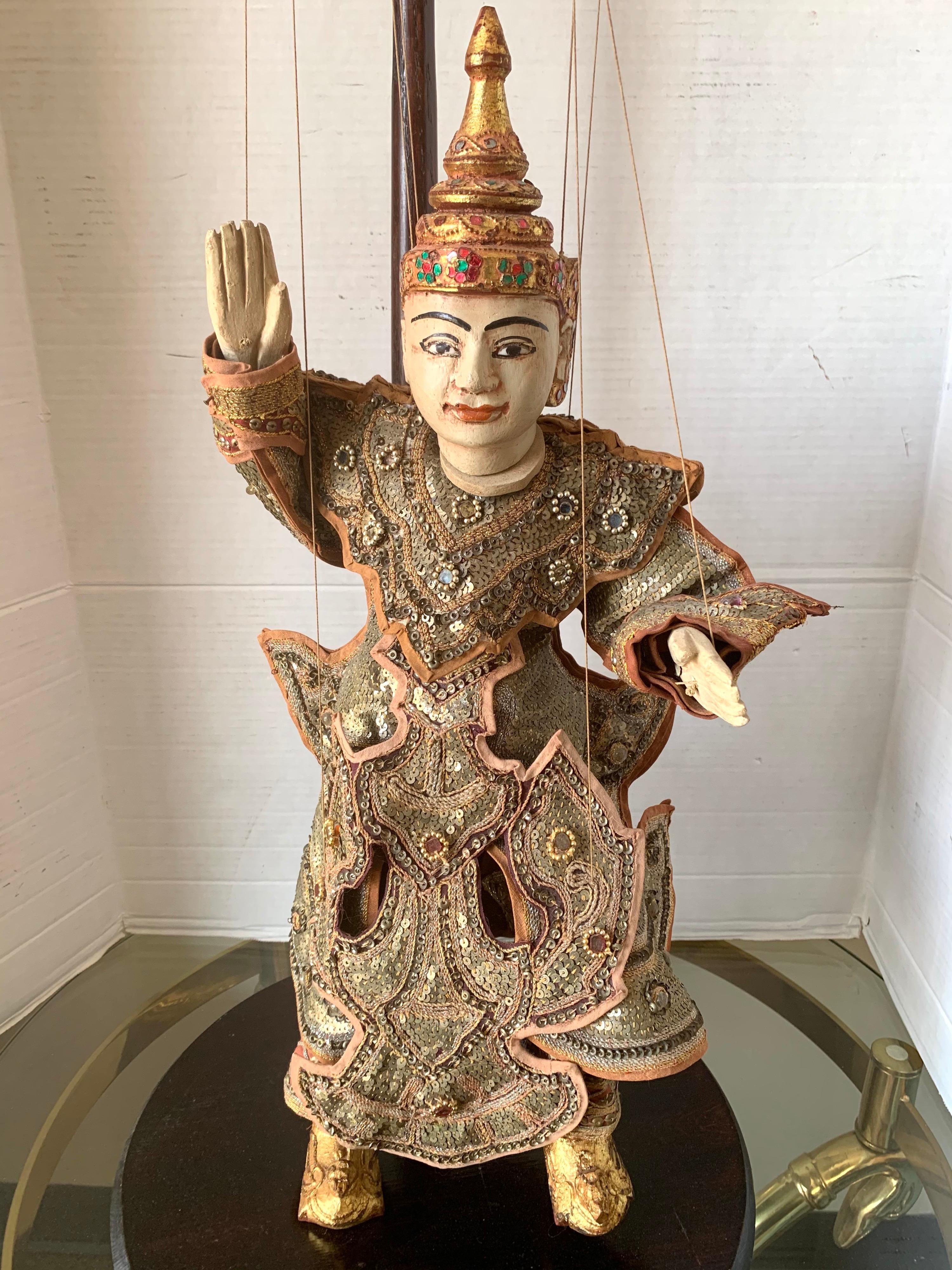 Stunning authentic Burmese ornately hand crafted Diety marionette puppet on display stand. The piece measures 23