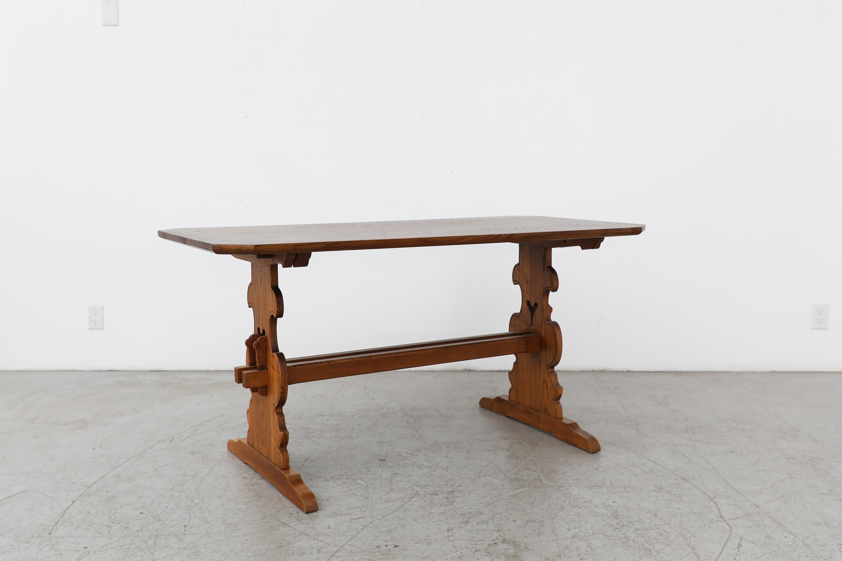 Mid-20th Century Austrian Ornate Brutalist Tyrolean Style Dark Pine Table with Angled Corners For Sale