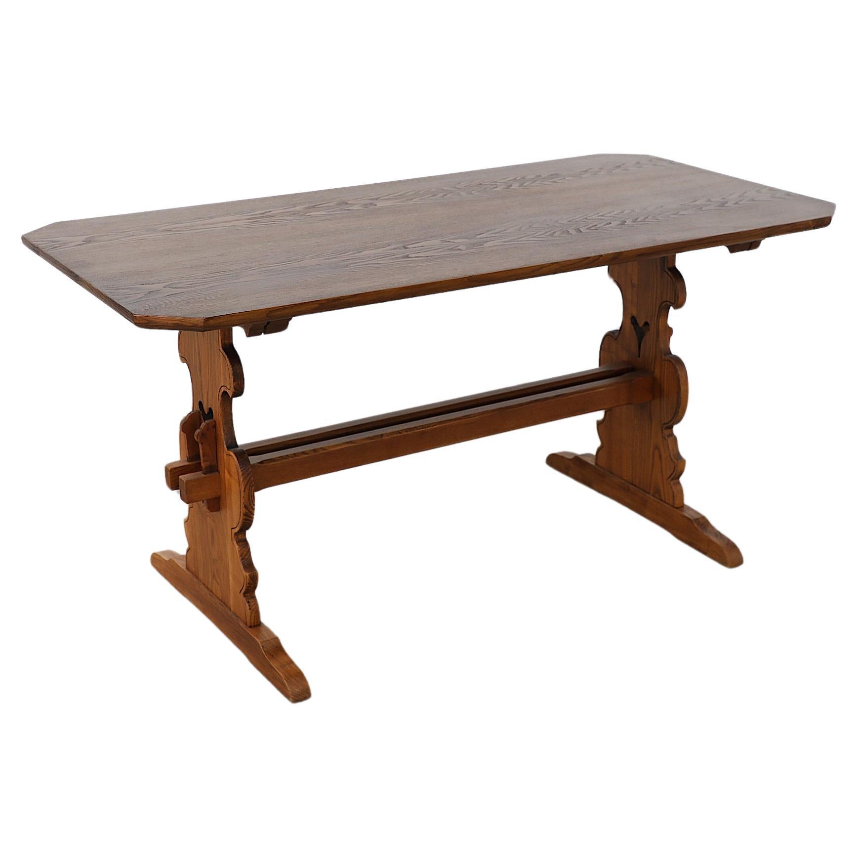 Austrian Ornate Brutalist Tyrolean Style Dark Pine Table with Angled Corners