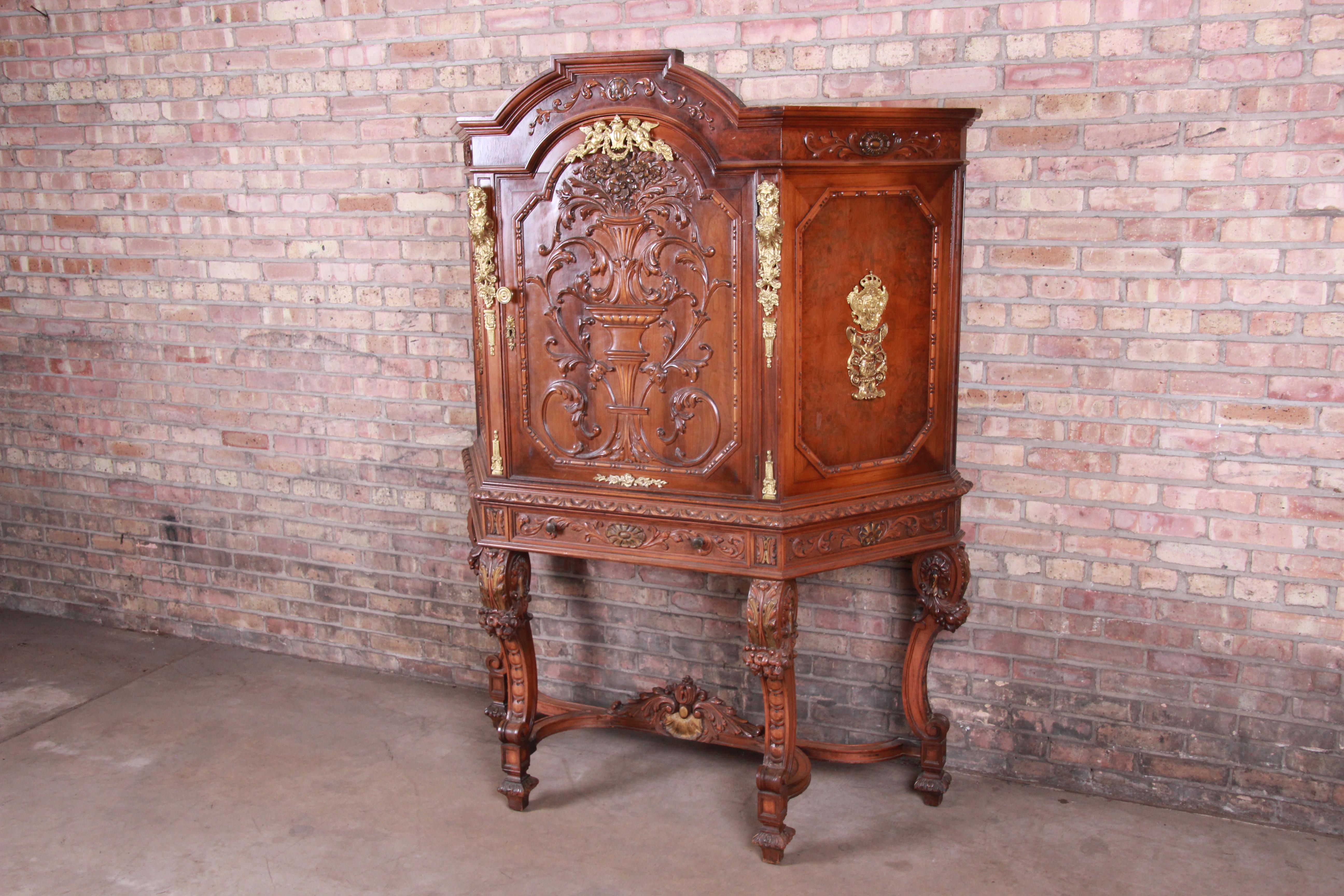 Ornate Carved Burled Walnut and Ormolu Mounted Bar Cabinet, circa 1920s In Good Condition In South Bend, IN