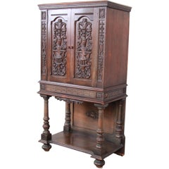 Antique Ornate Carved Walnut Bar Cabinet, circa 1920s